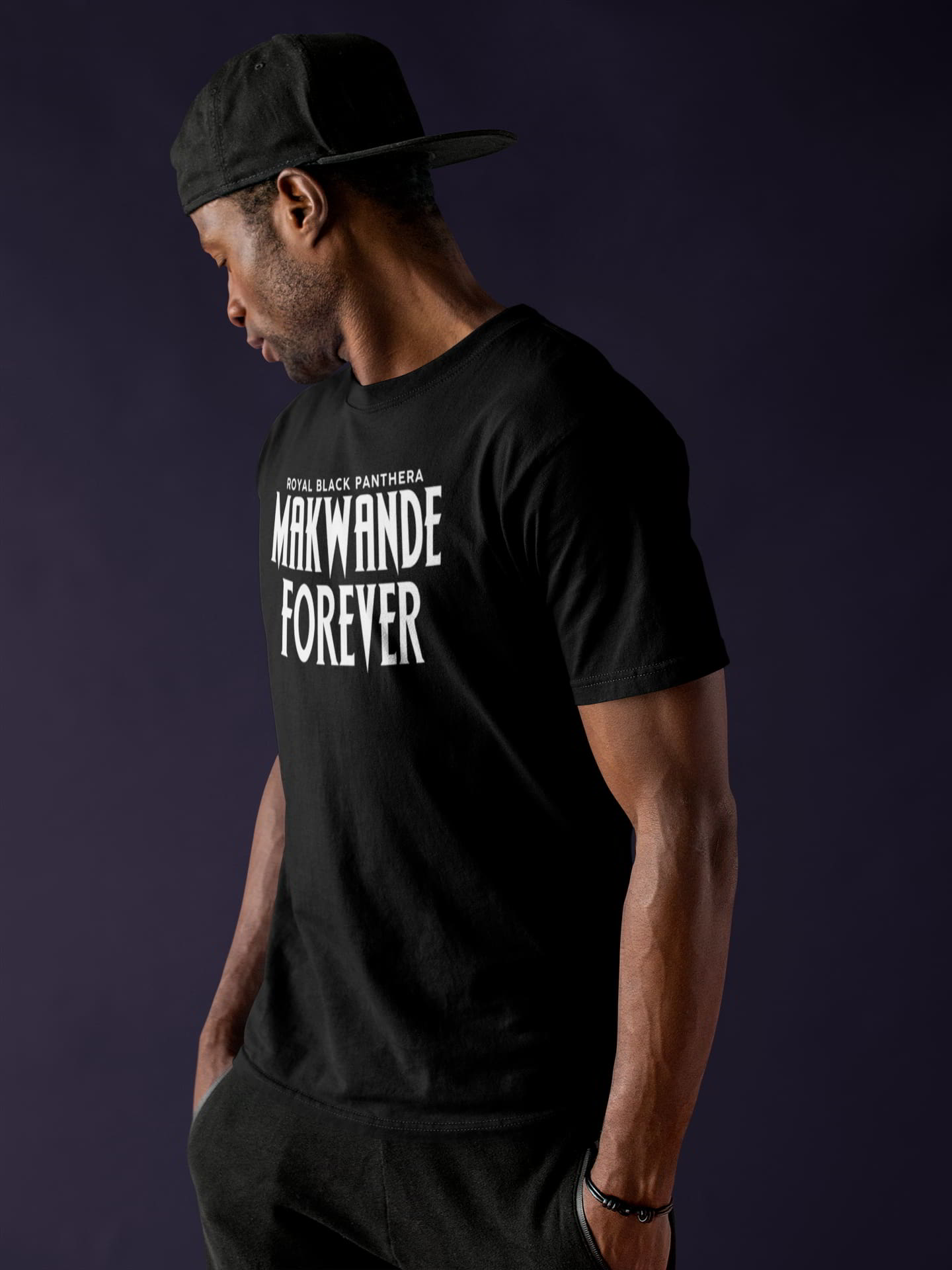 optimized black dude wearing a round neck tee mockup while against a solid backdrop a17154
